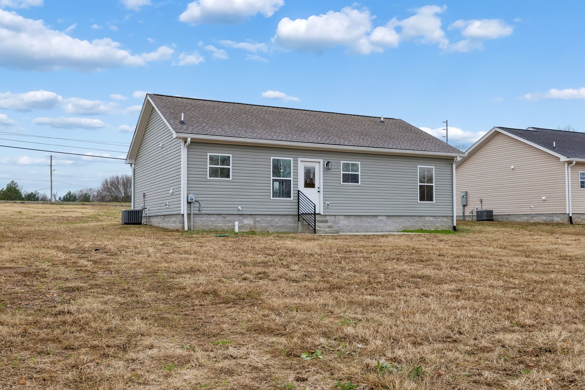 1035 Landing Lane Adams, TN 37010 - Photo 26 of 26 a backyard of a house