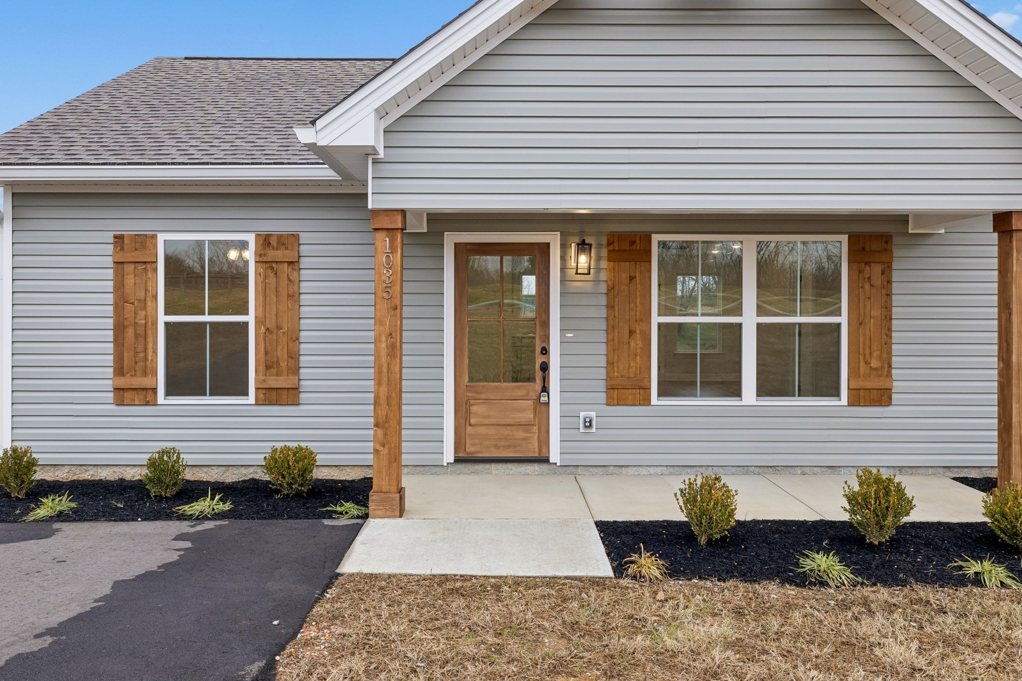 1035 Landing Lane Adams, TN 37010 - Photo 4 of 26 a front view of a house