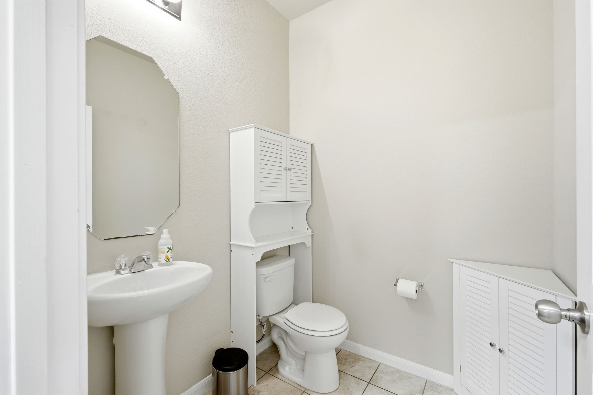 1702 Atlas Road Cedar Park, TX 78613 - Photo 26 of 31 Half bath featuring toilet and light tile patterned floors