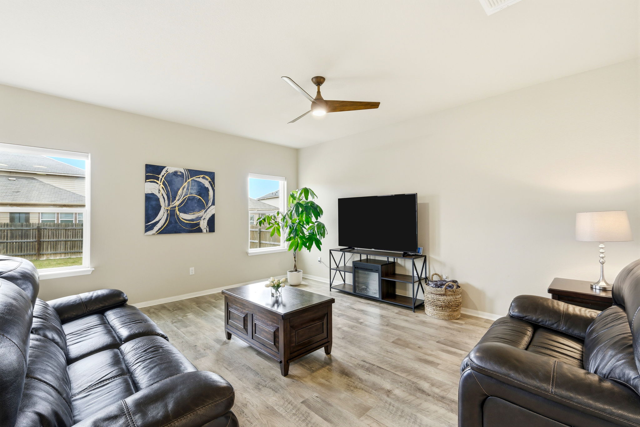1702 Atlas Road Cedar Park, TX 78613 - Photo 5 of 31 Living area with light wood-style flooring and ceiling fan