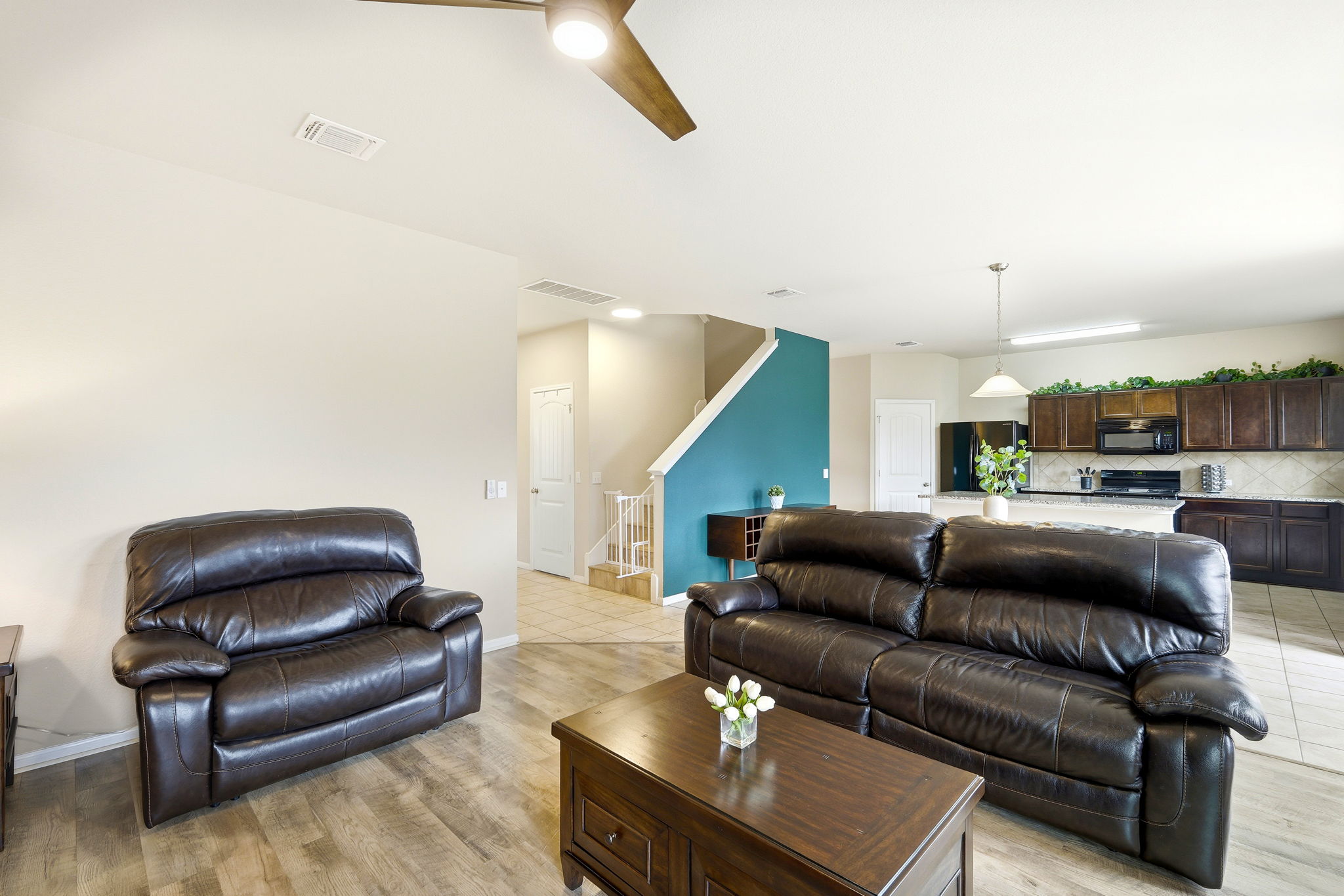 1702 Atlas Road Cedar Park, TX 78613 - Photo 6 of 31 Living area with ceiling fan and light wood-style flooring