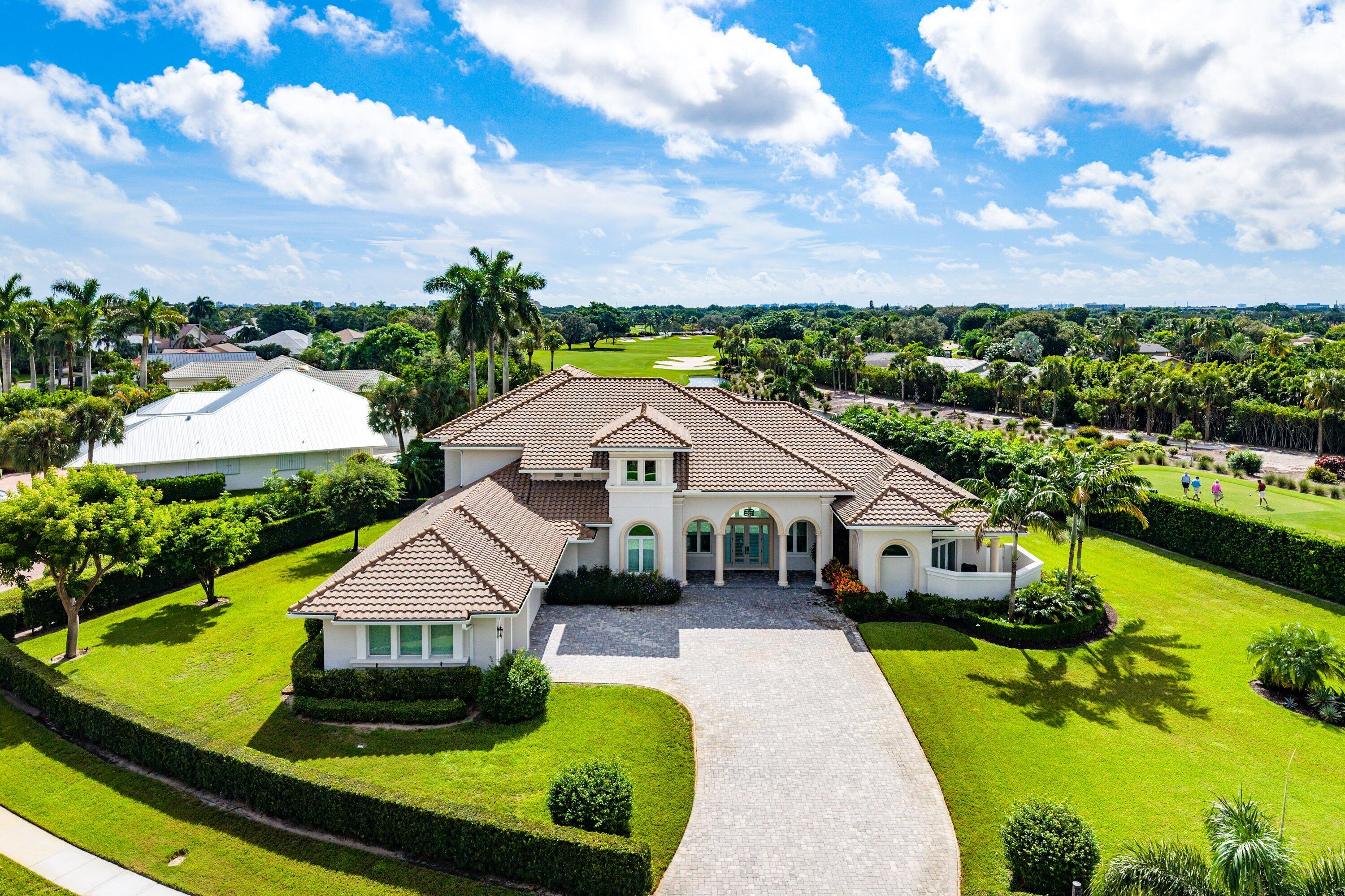 4600 Bocaire Boulevard Boca Raton, FL 33487 - Photo 1 of 98 a aerial view of a house with swimming pool big yard and large trees