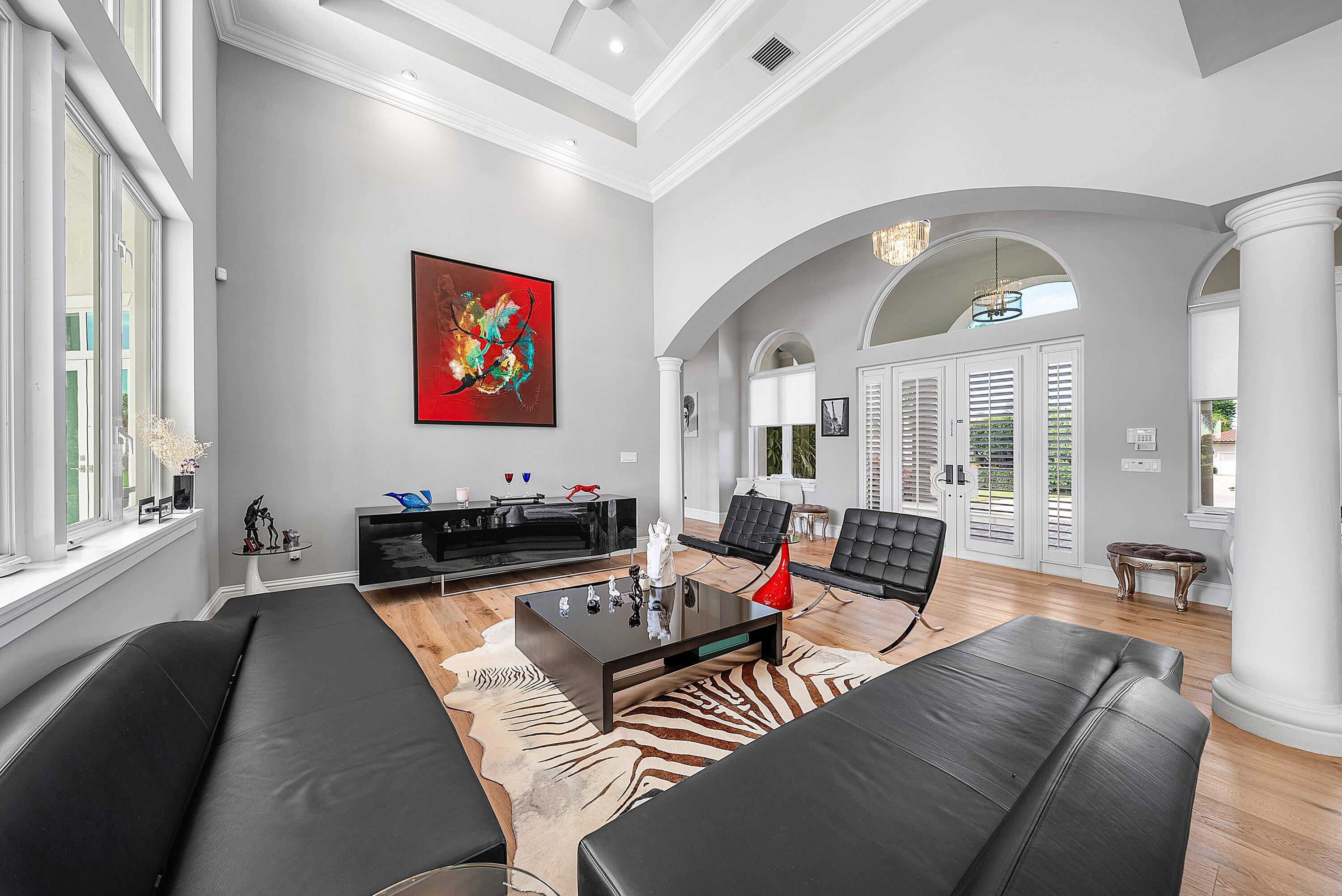 4600 Bocaire Boulevard Boca Raton, FL 33487 - Photo 13 of 98 a living room with furniture and a large window