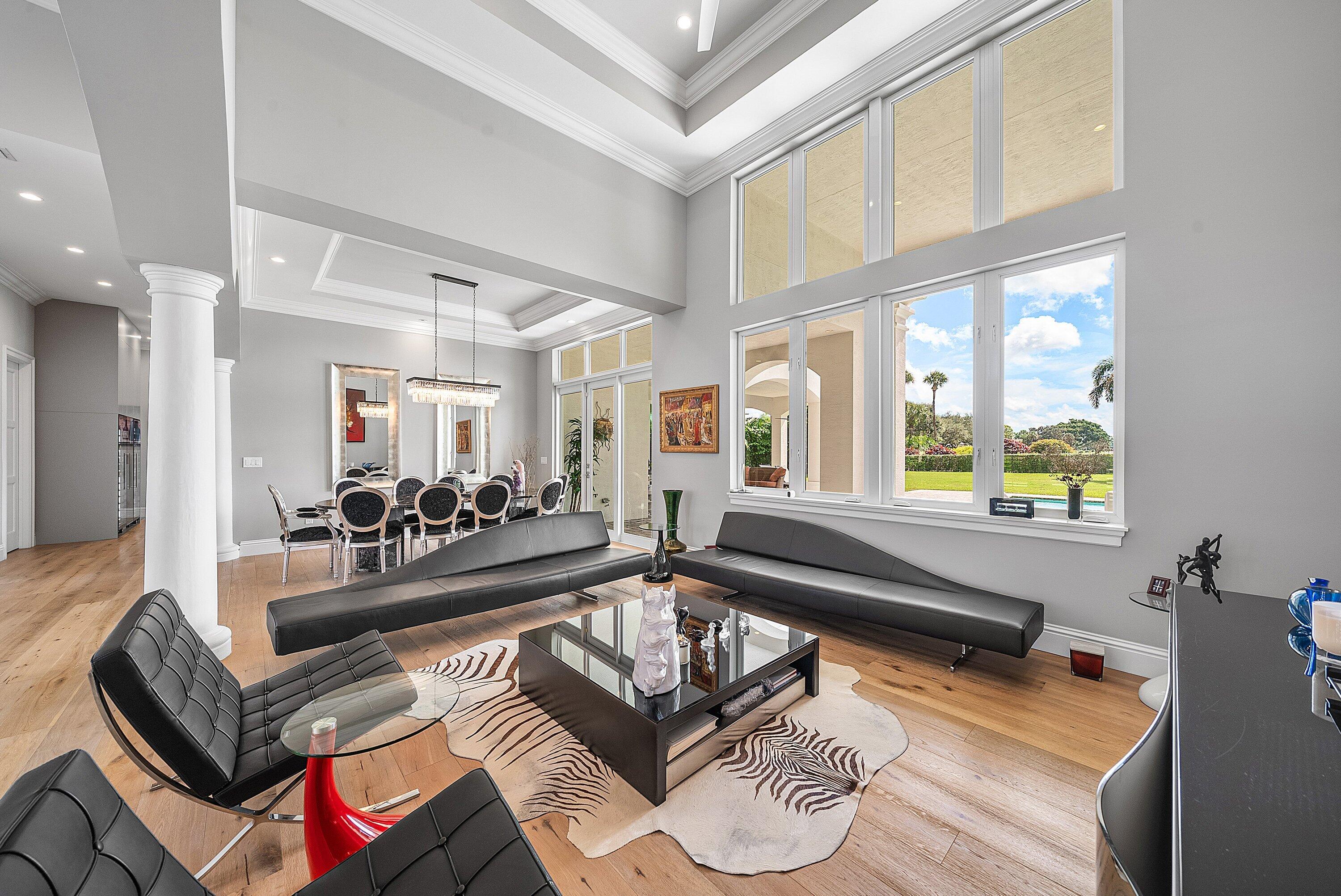 4600 Bocaire Boulevard Boca Raton, FL 33487 - Photo 14 of 98 a living room with furniture and a large window