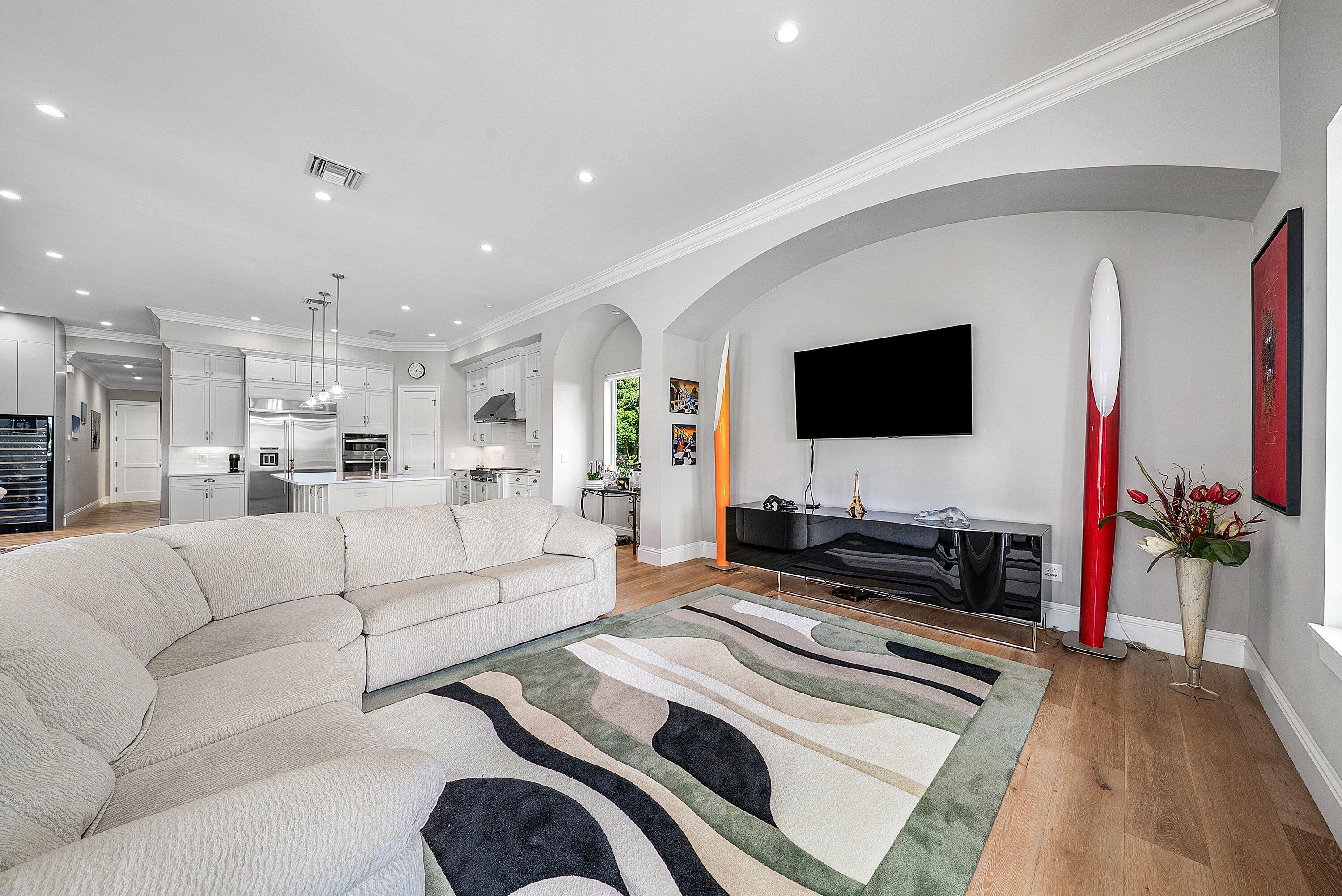 4600 Bocaire Boulevard Boca Raton, FL 33487 - Photo 29 of 98 a living room with furniture and a flat screen tv