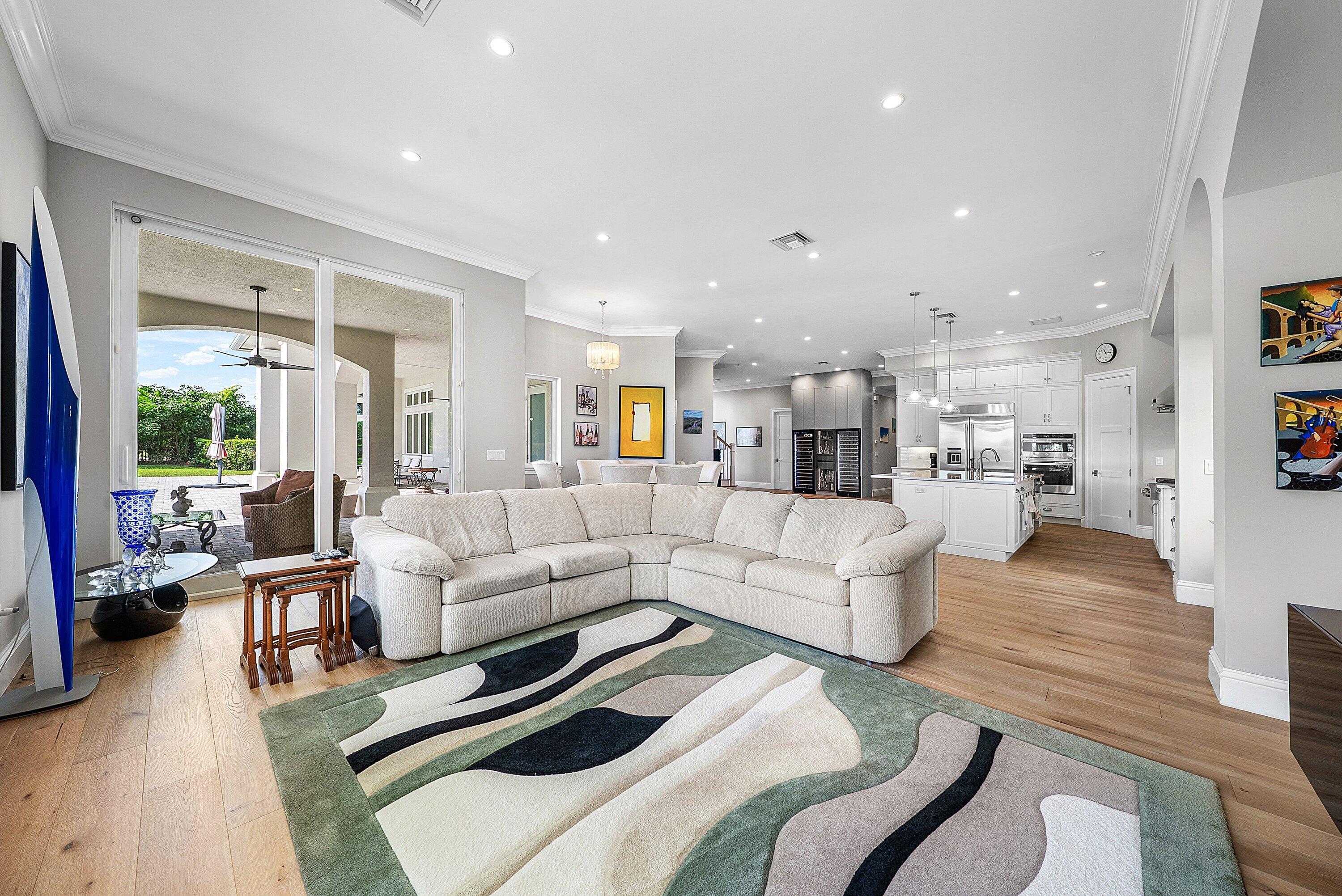 4600 Bocaire Boulevard Boca Raton, FL 33487 - Photo 30 of 98 a living room with furniture and a wooden floor