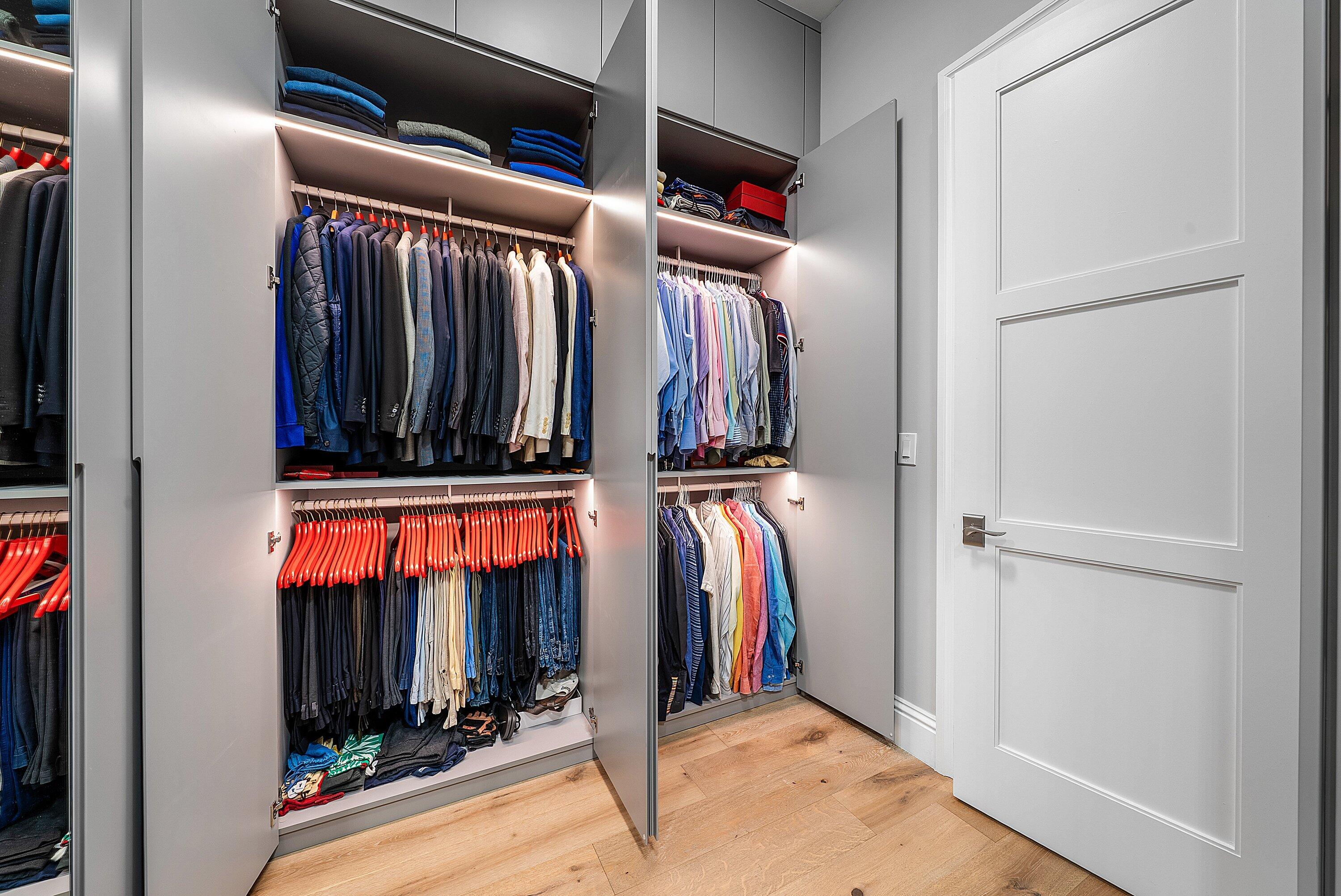 4600 Bocaire Boulevard Boca Raton, FL 33487 - Photo 34 of 98 a view of walk in closet with clothes