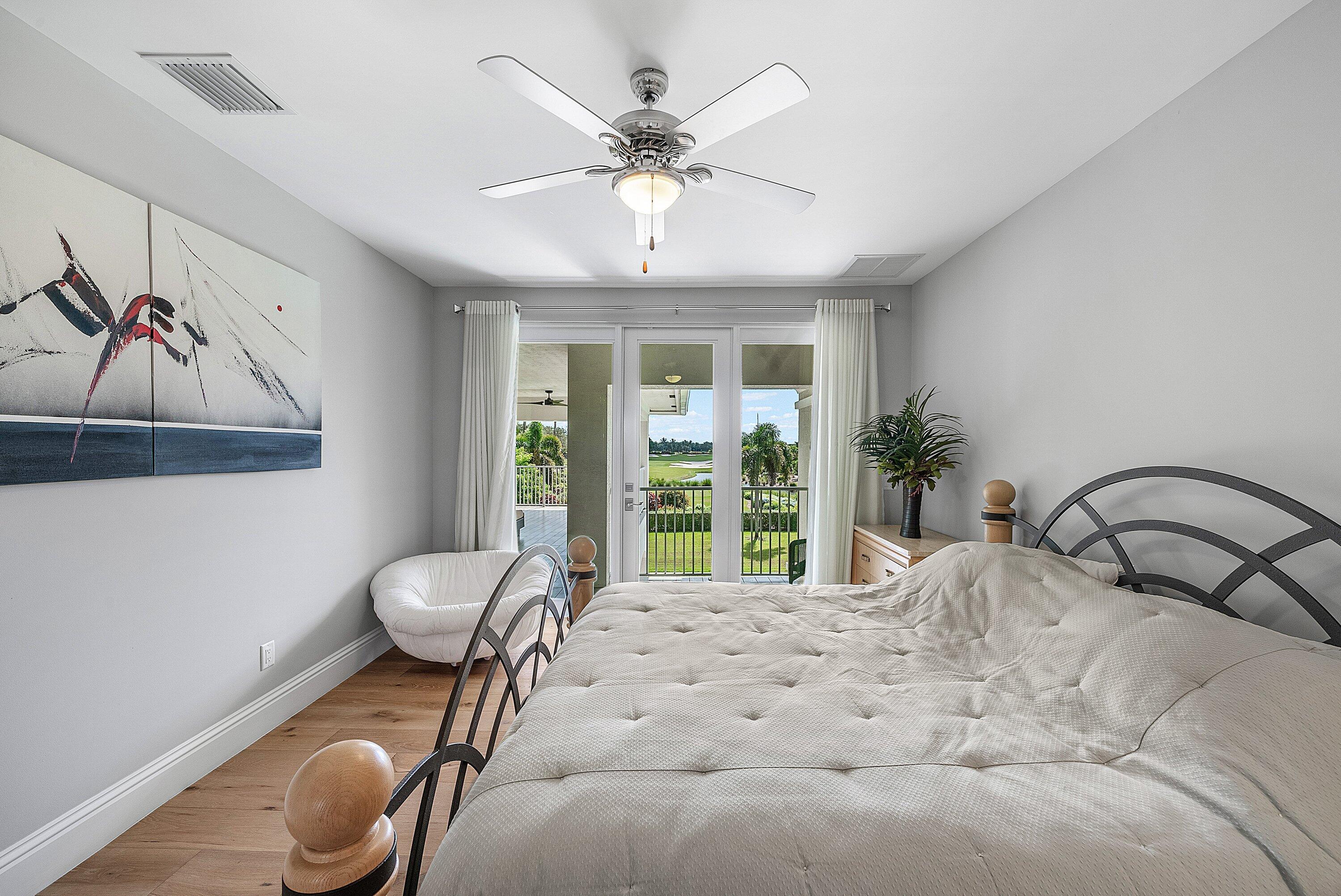 4600 Bocaire Boulevard Boca Raton, FL 33487 - Photo 40 of 98 a bedroom with furniture and a large window