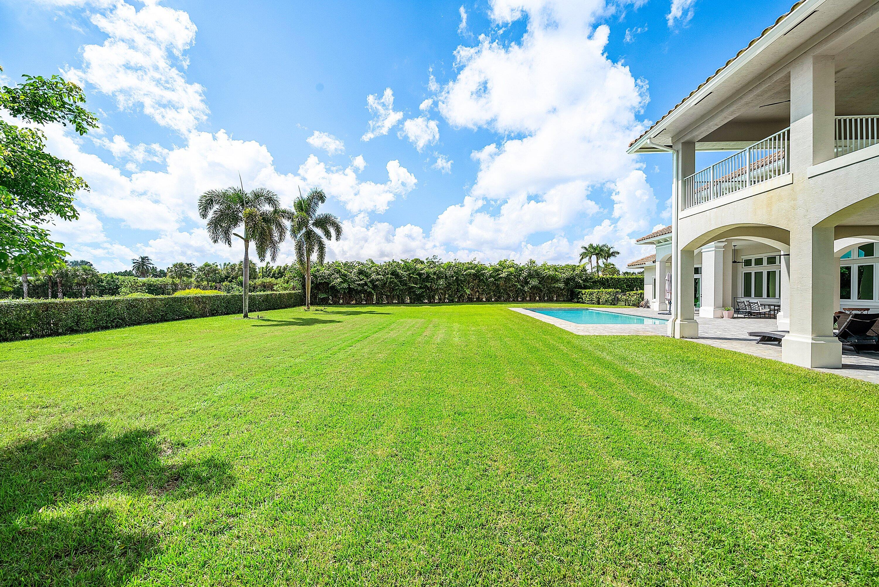 4600 Bocaire Boulevard Boca Raton, FL 33487 - Photo 66 of 98 a view of a house with a big yard