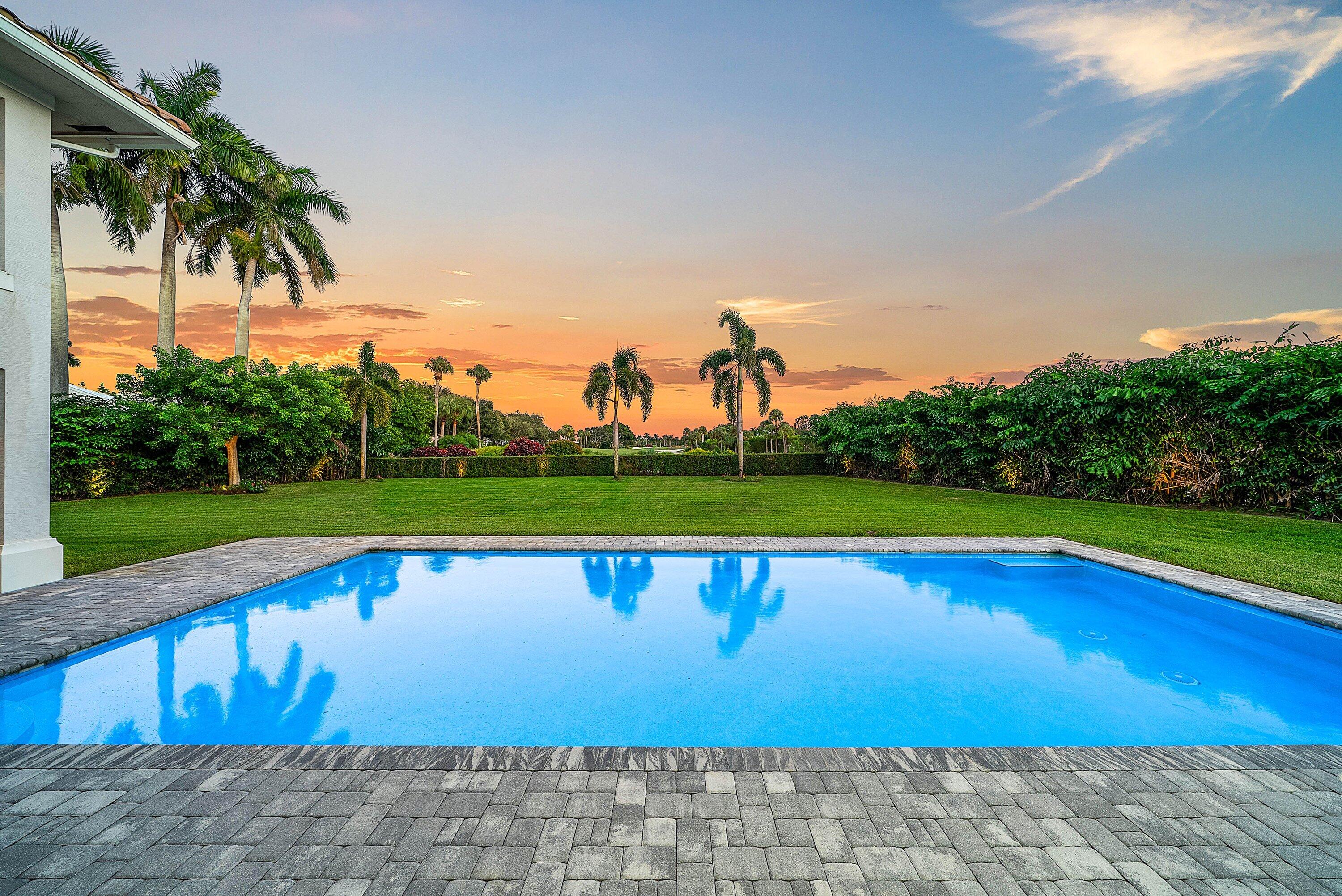 4600 Bocaire Boulevard Boca Raton, FL 33487 - Photo 71 of 98 a view of a swimming pool with a yard