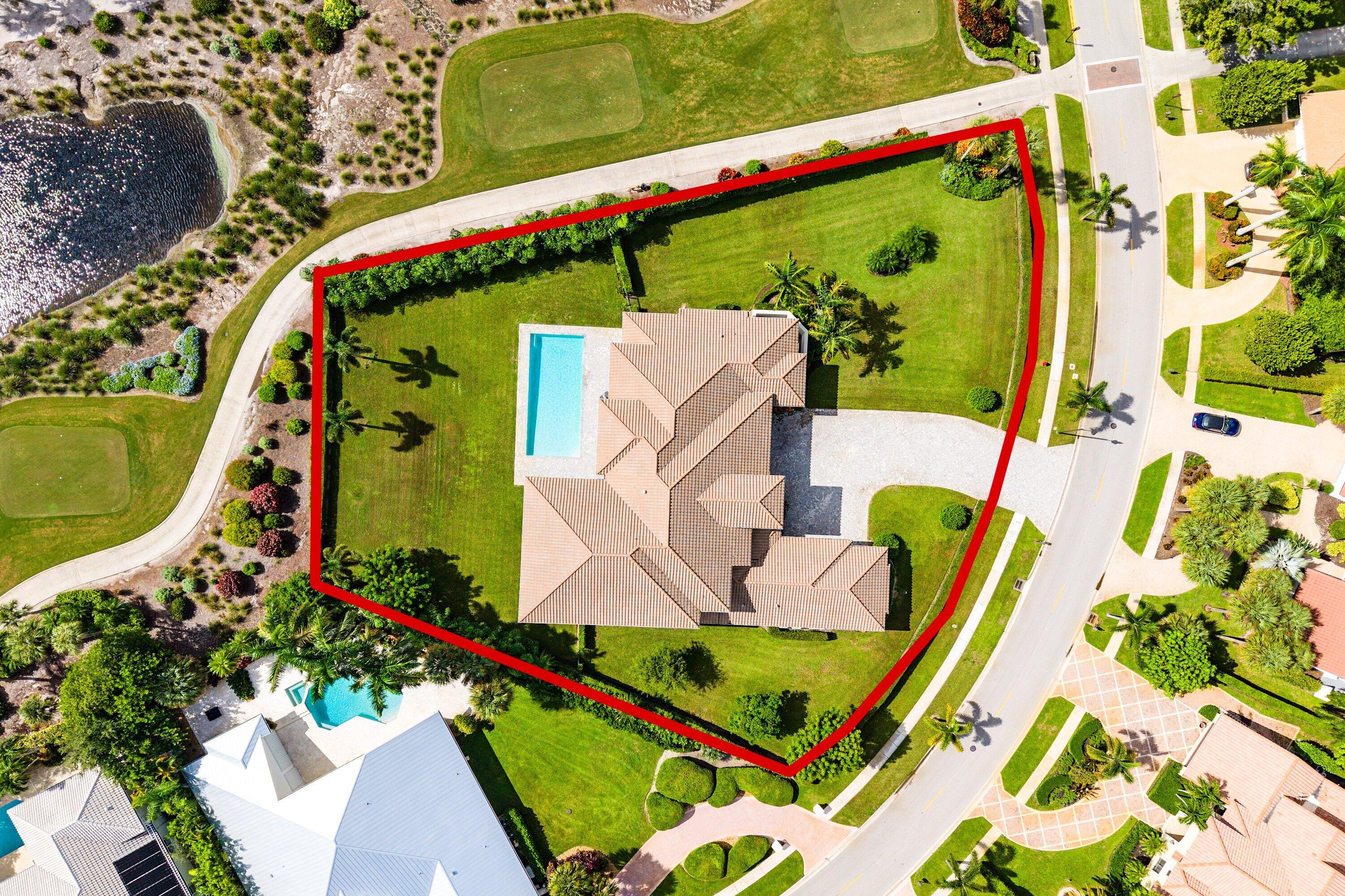 4600 Bocaire Boulevard Boca Raton, FL 33487 - Photo 76 of 98 an aerial view of a tennis ground and a swimming pool