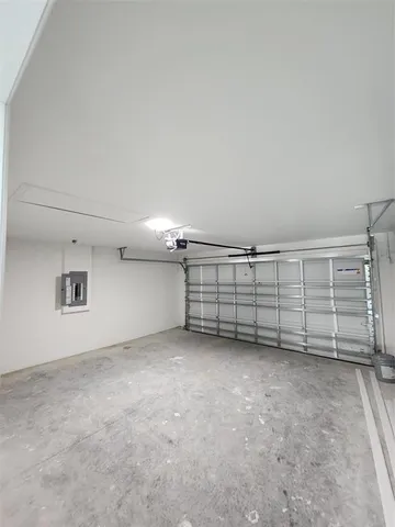 a view of a lake with houses in the back