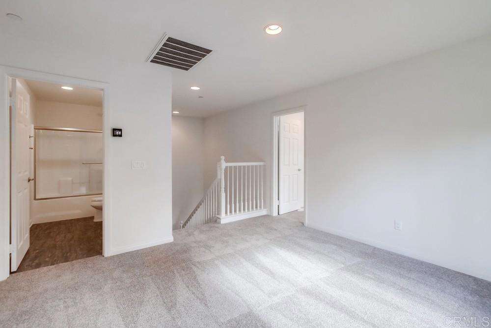 13109 Beacon View Lane El Cajon, CA 92021 - Photo 13 of 36 a view of an empty room and window