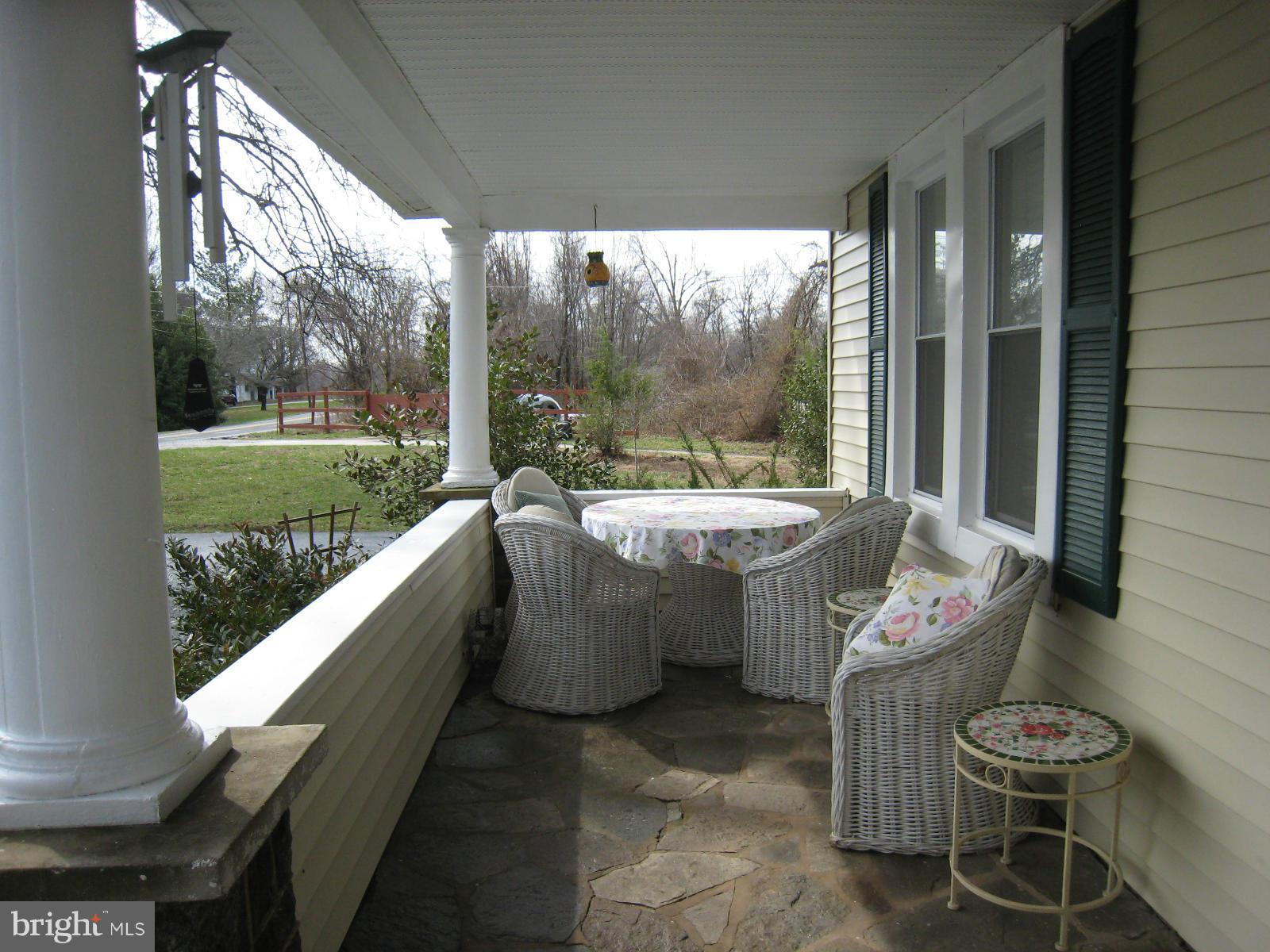 2826 Ridge Road Baltimore, MD 21244 - Photo 2 of 30 a outdoor dining space with furniture and garden