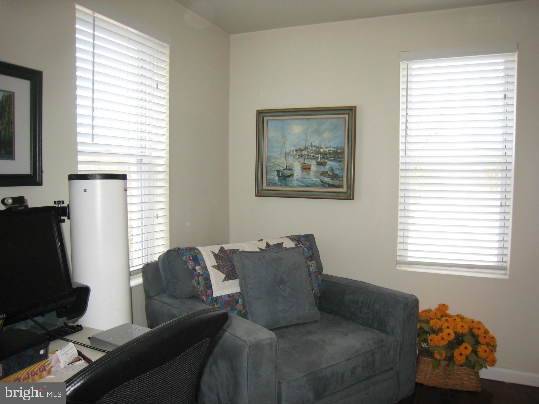 2826 Ridge Road Baltimore, MD 21244 - Photo 21 of 30 a living room with furniture and a window