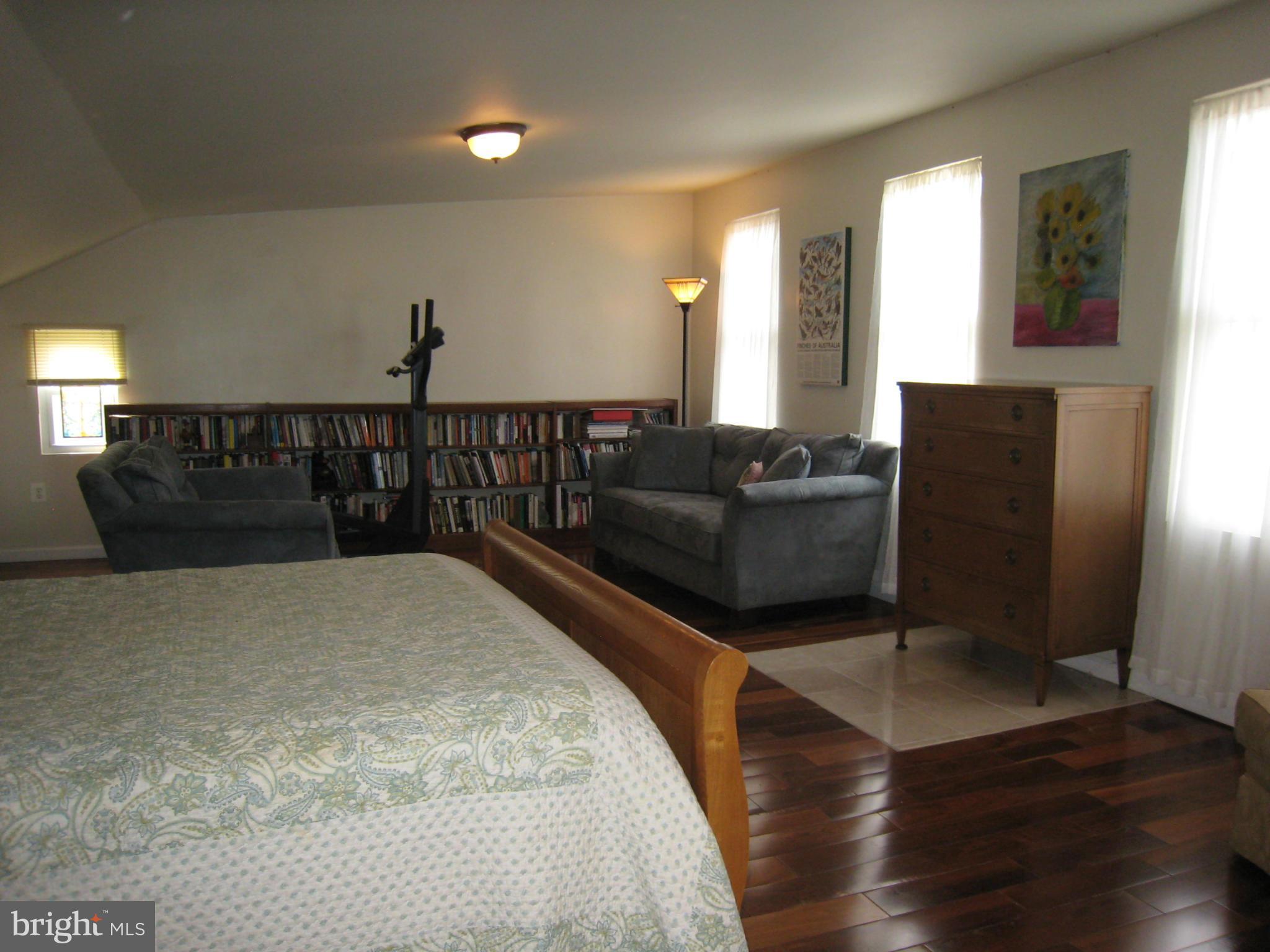 2826 Ridge Road Baltimore, MD 21244 - Photo 24 of 30 a living room with furniture and wooden floor