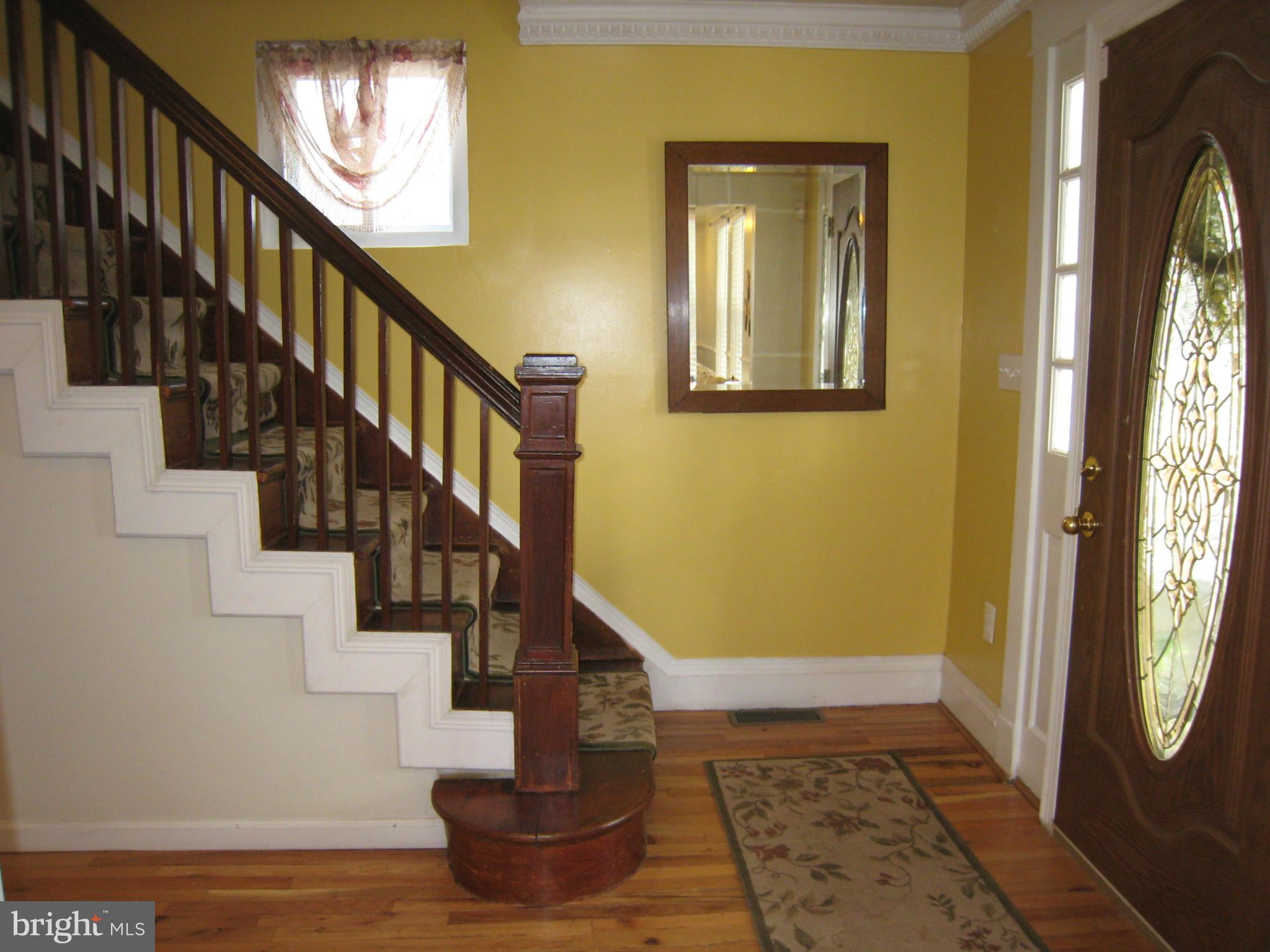 2826 Ridge Road Baltimore, MD 21244 - Photo 4 of 30 a view of entryway and hall with wooden floor