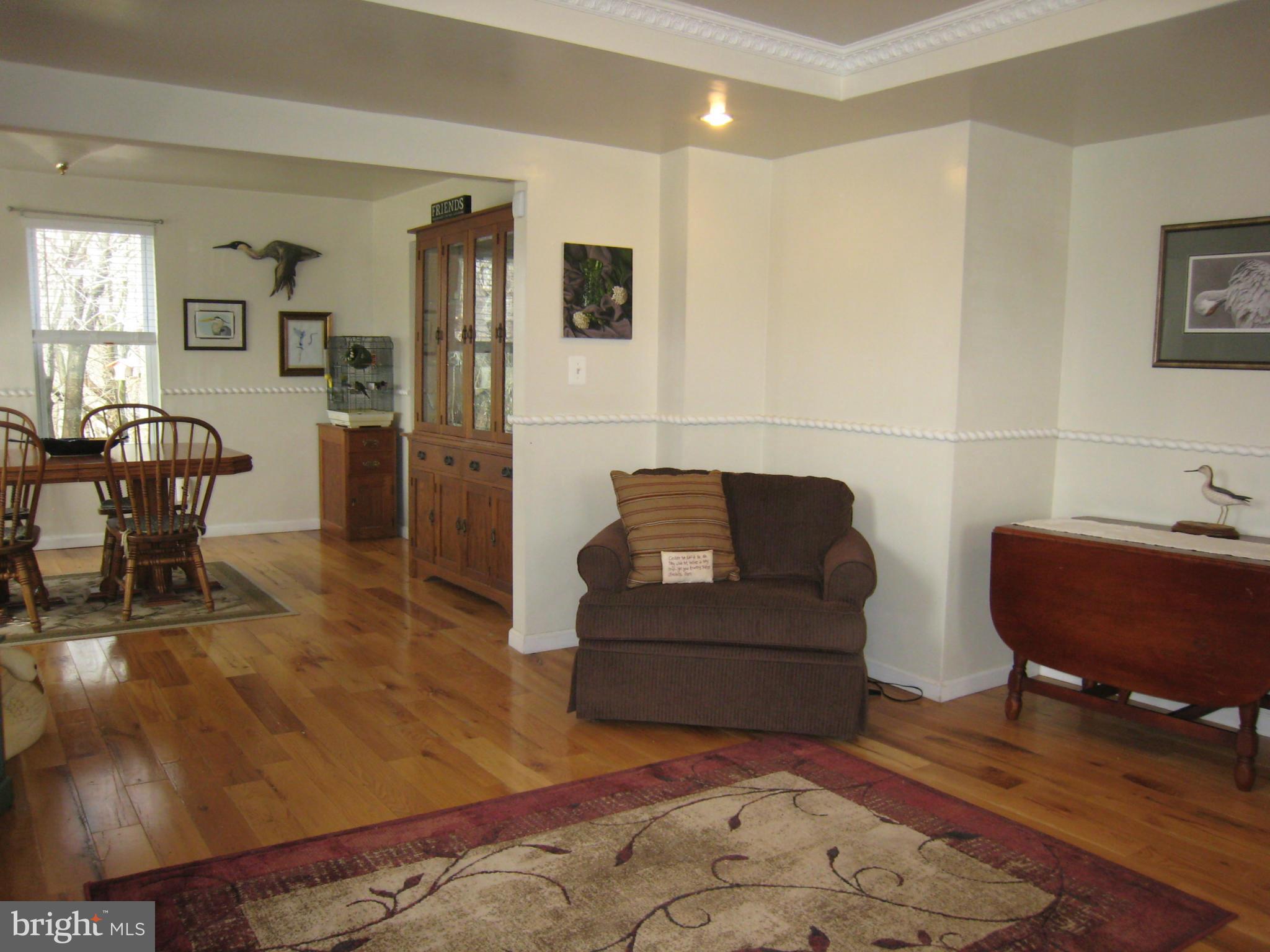 2826 Ridge Road Baltimore, MD 21244 - Photo 8 of 30 a living room with furniture and a rug