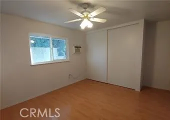 a bathroom with a shower and a toilet