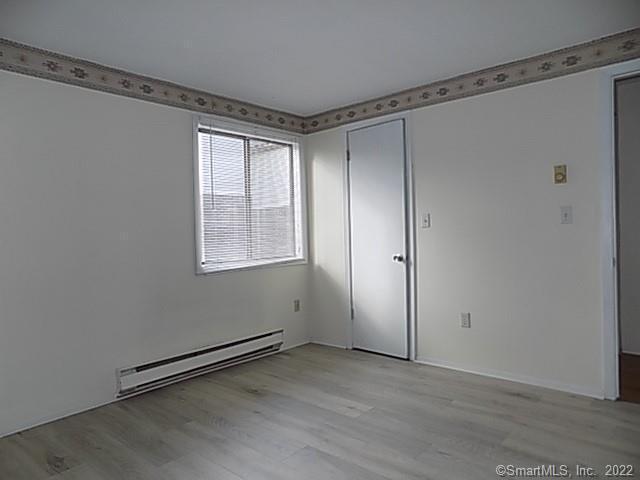 7 Padanaram Road, Unit J238 Danbury, CT 06811 - Photo 11 of 18 a view of an empty room