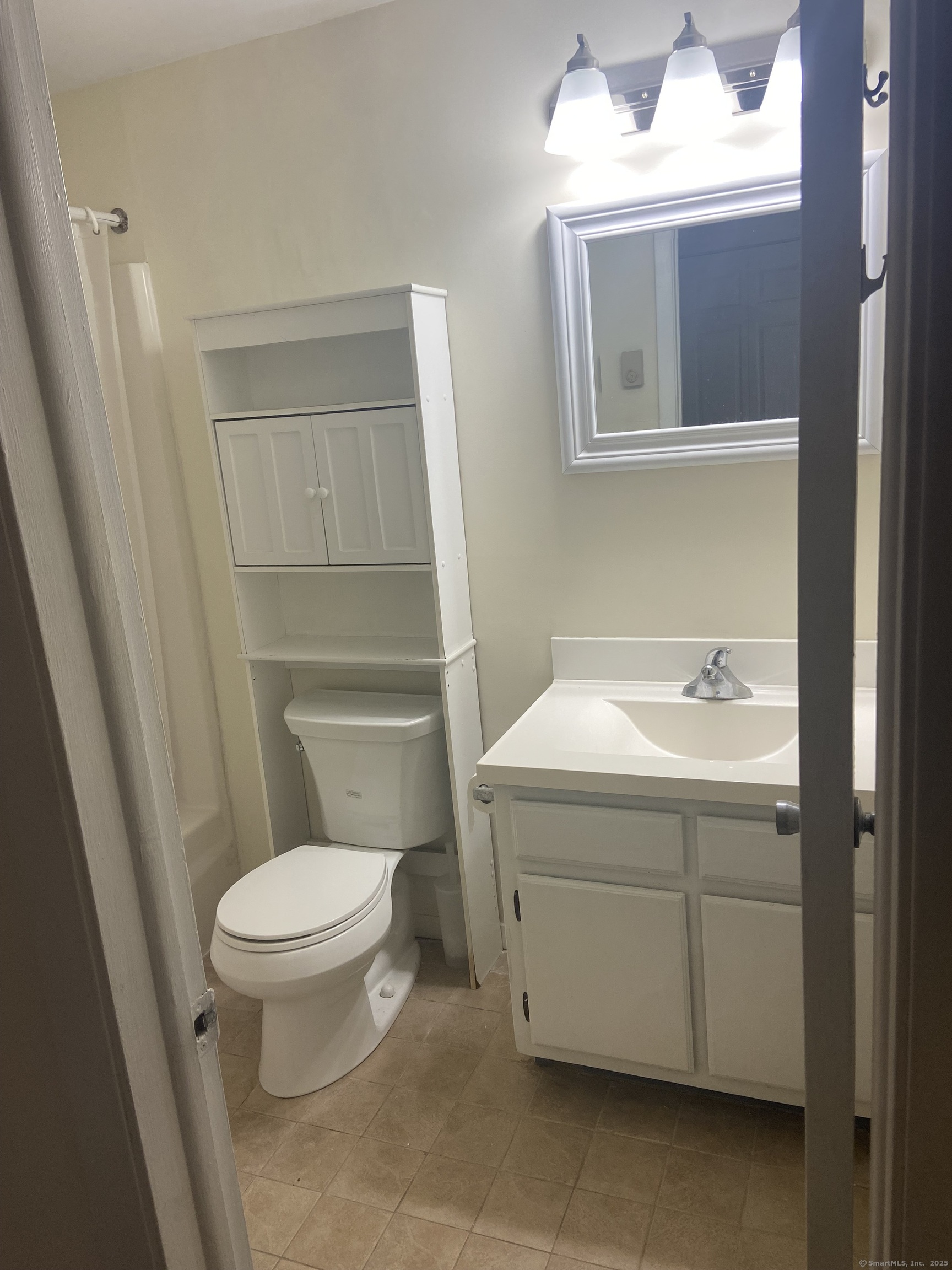 7 Padanaram Road, Unit J238 Danbury, CT 06811 - Photo 15 of 18 a bathroom with a sink toilet and vanity