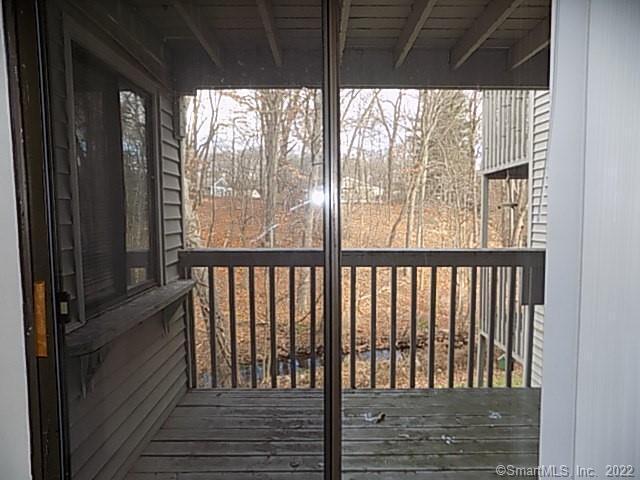 7 Padanaram Road, Unit J238 Danbury, CT 06811 - Photo 5 of 18 a view of balcony with furniture