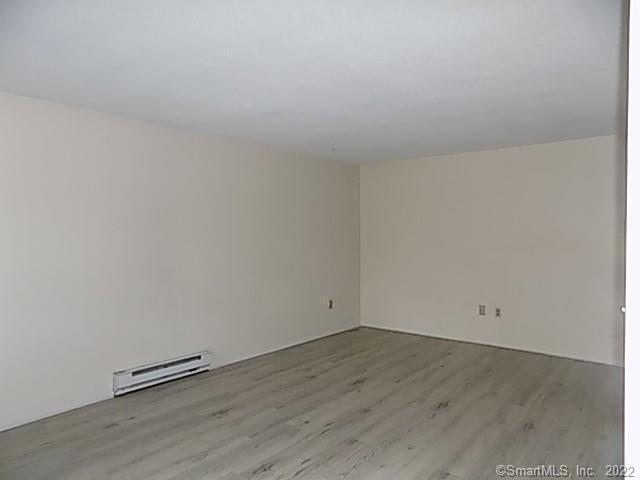 7 Padanaram Road, Unit J238 Danbury, CT 06811 - Photo 8 of 18 wooden floor in a room