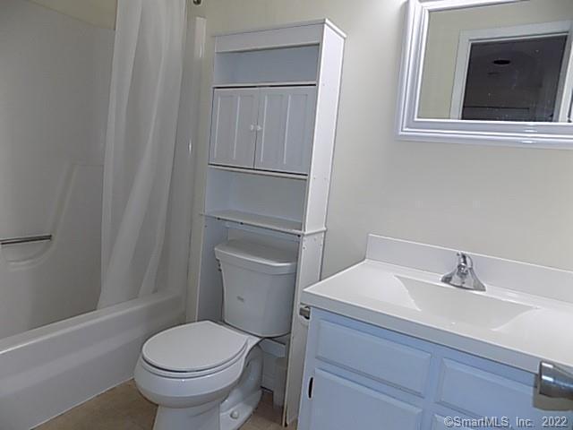 7 Padanaram Road, Unit J238 Danbury, CT 06811 - Photo 9 of 18 a bathroom with a sink toilet and vanity