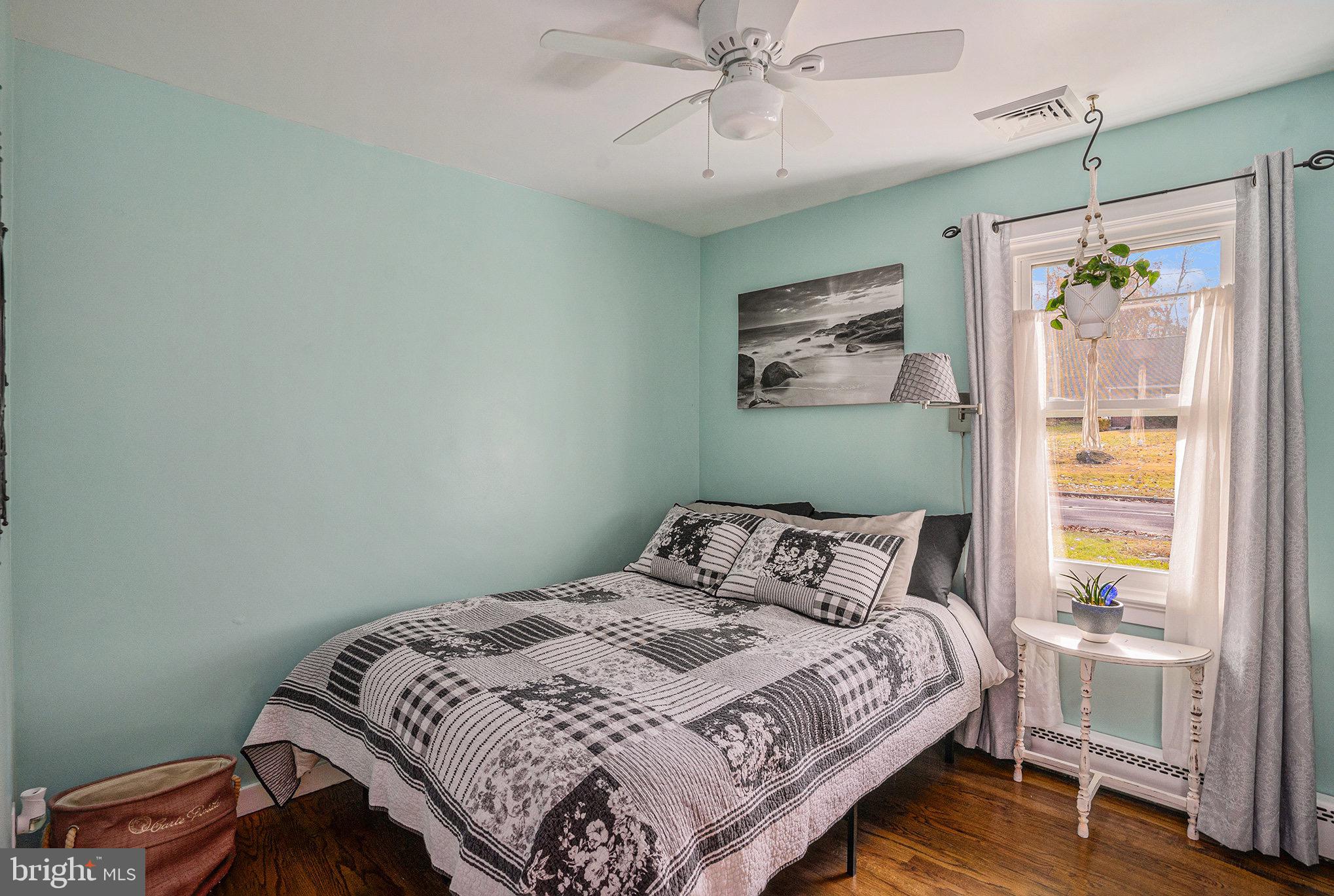 501 Walnut Street Green Lane, PA 18054 - Photo 13 of 28 a bedroom with a bed and a window