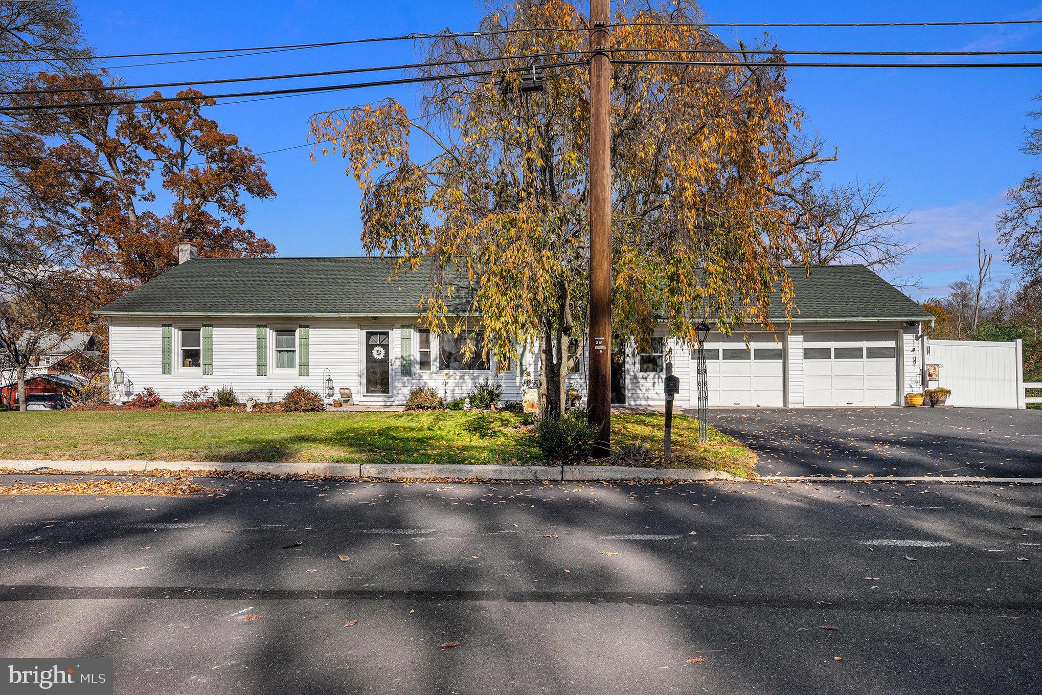 501 Walnut Street Green Lane, PA 18054 - Photo 2 of 28 a view of a house with a yard