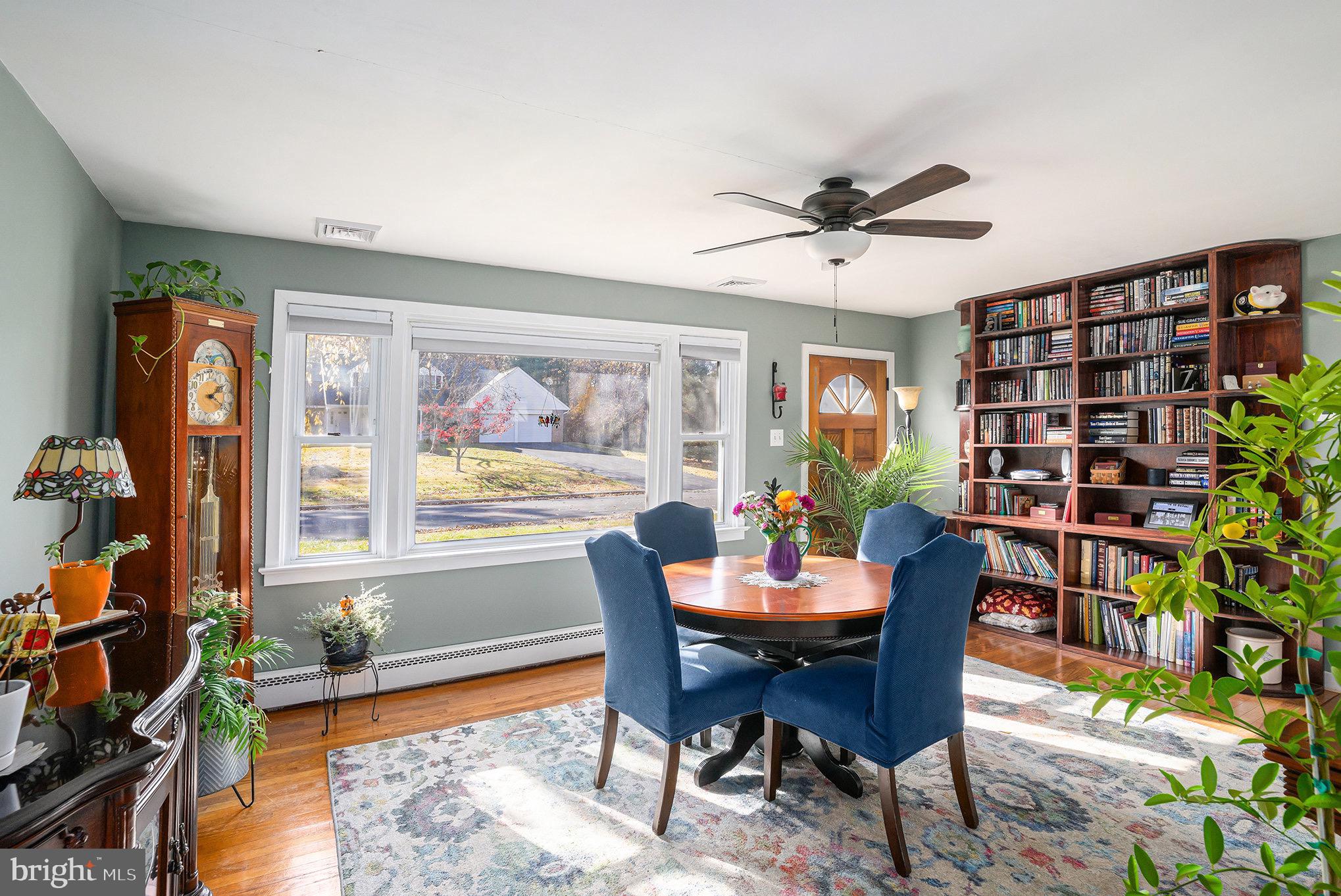 501 Walnut Street Green Lane, PA 18054 - Photo 10 of 28 a dining room with furniture a book and a rug