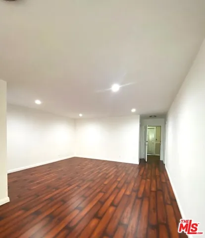 a view of livingroom with wooden floor