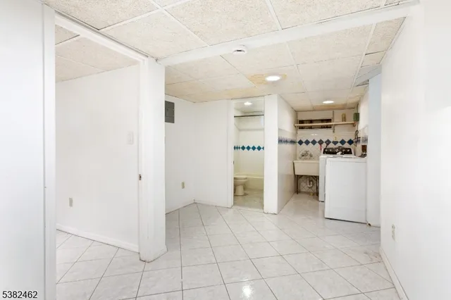 a kitchen with stainless steel appliances a refrigerator and a stove