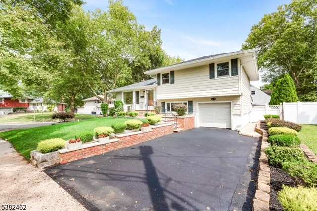a front view of a house with a porch
