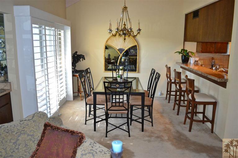 110 South Racquet Club Drive Rancho Mirage, CA 92270 - Photo 9 of 17 a dining room with furniture and window