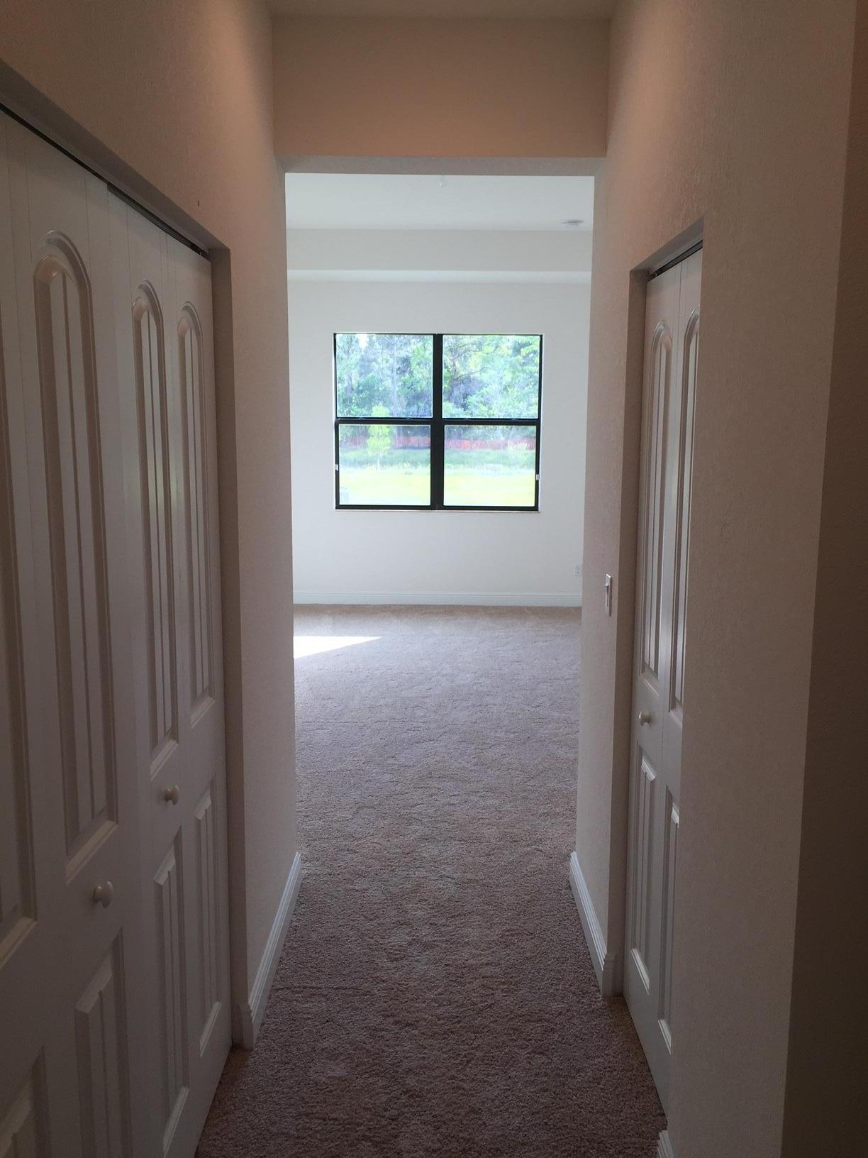 5938 Southeast Entry Court Stuart, FL 34997 - Photo 21 of 37 Looking into master bedroom