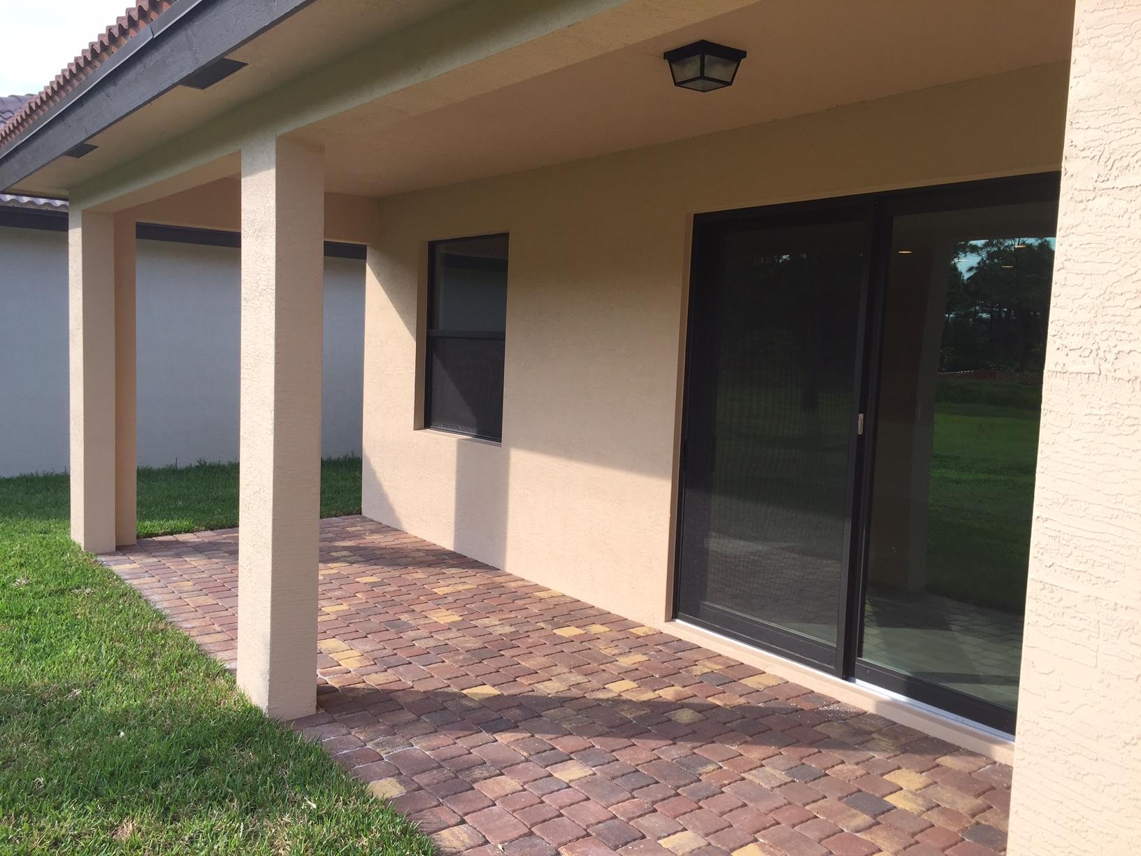 5938 Southeast Entry Court Stuart, FL 34997 - Photo 23 of 37 Covered Patio