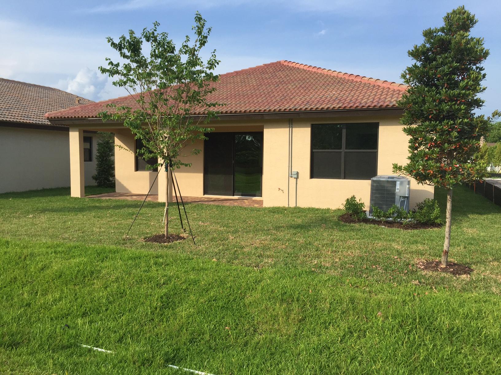 5938 Southeast Entry Court Stuart, FL 34997 - Photo 25 of 37 Rear of home