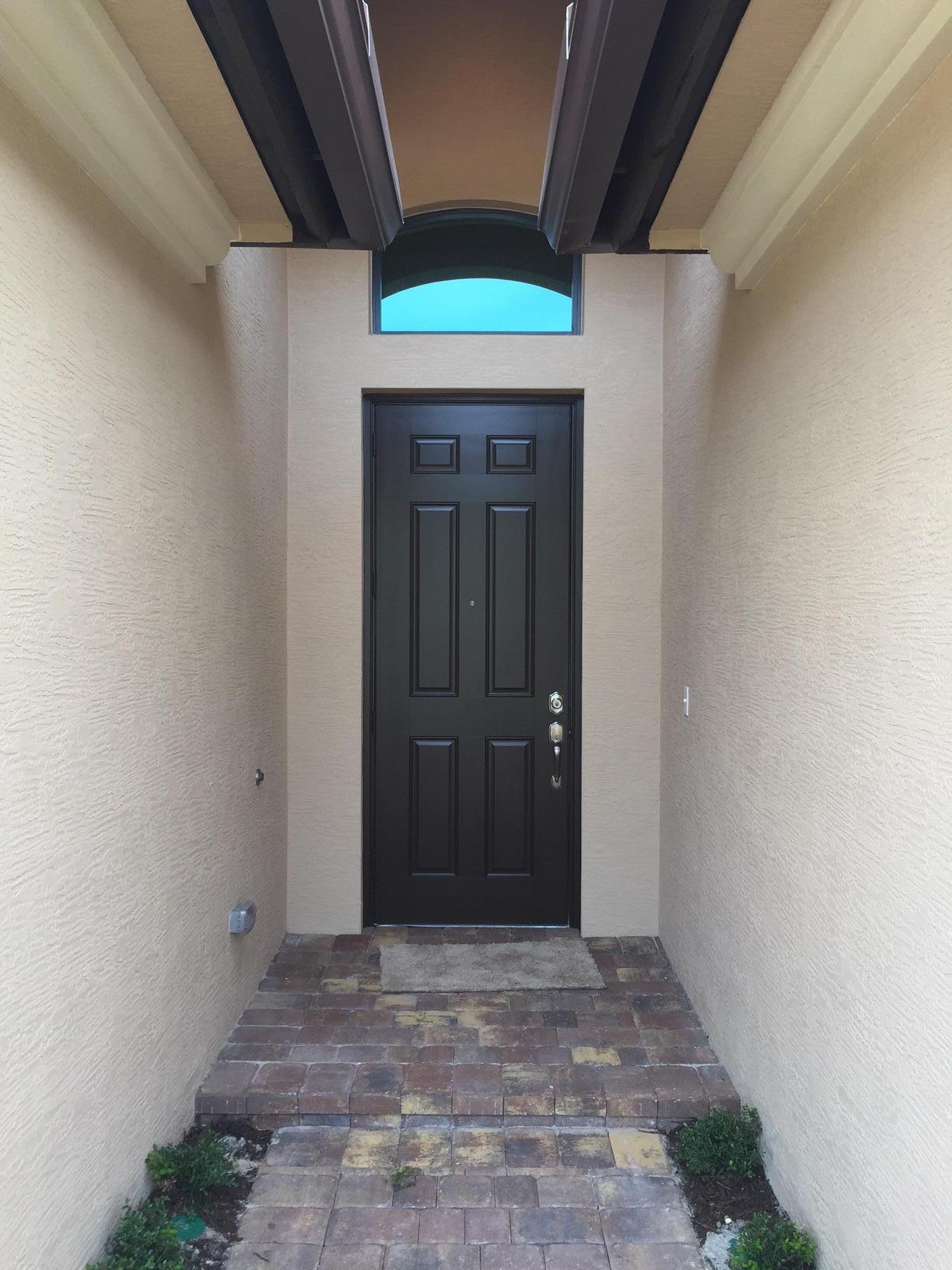 5938 Southeast Entry Court Stuart, FL 34997 - Photo 3 of 37 Front Entry exterior