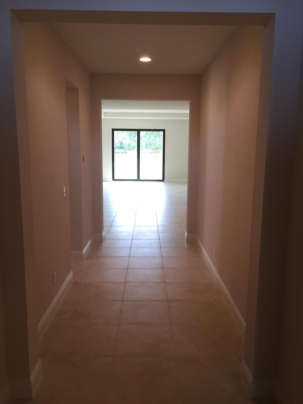 5938 Southeast Entry Court Stuart, FL 34997 - Photo 5 of 37 Walking in