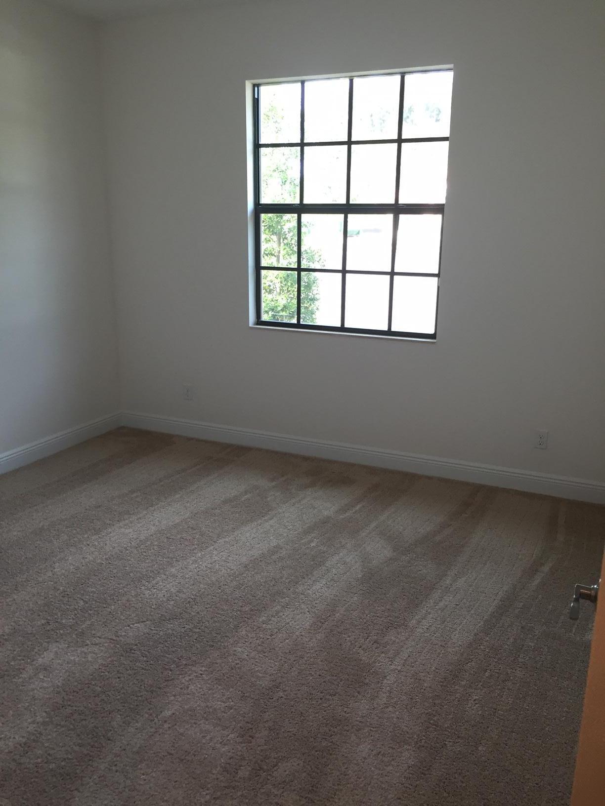 5938 Southeast Entry Court Stuart, FL 34997 - Photo 6 of 37 Bedroom 2