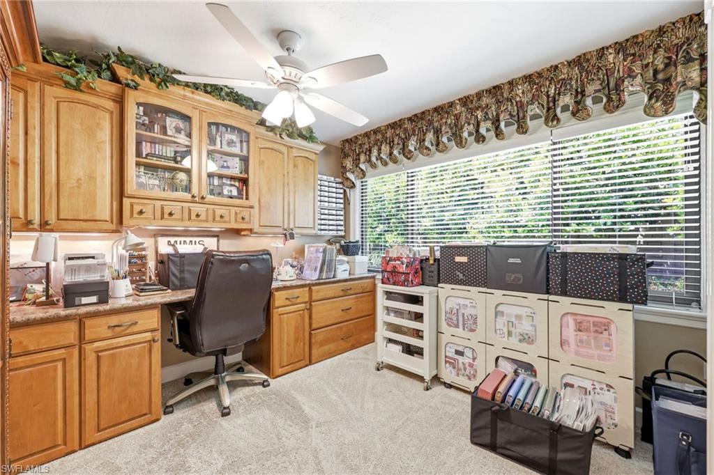 5201 31st Place Southwest Naples, FL 34116 - Photo 12 of 24 a view of a workspace with furniture