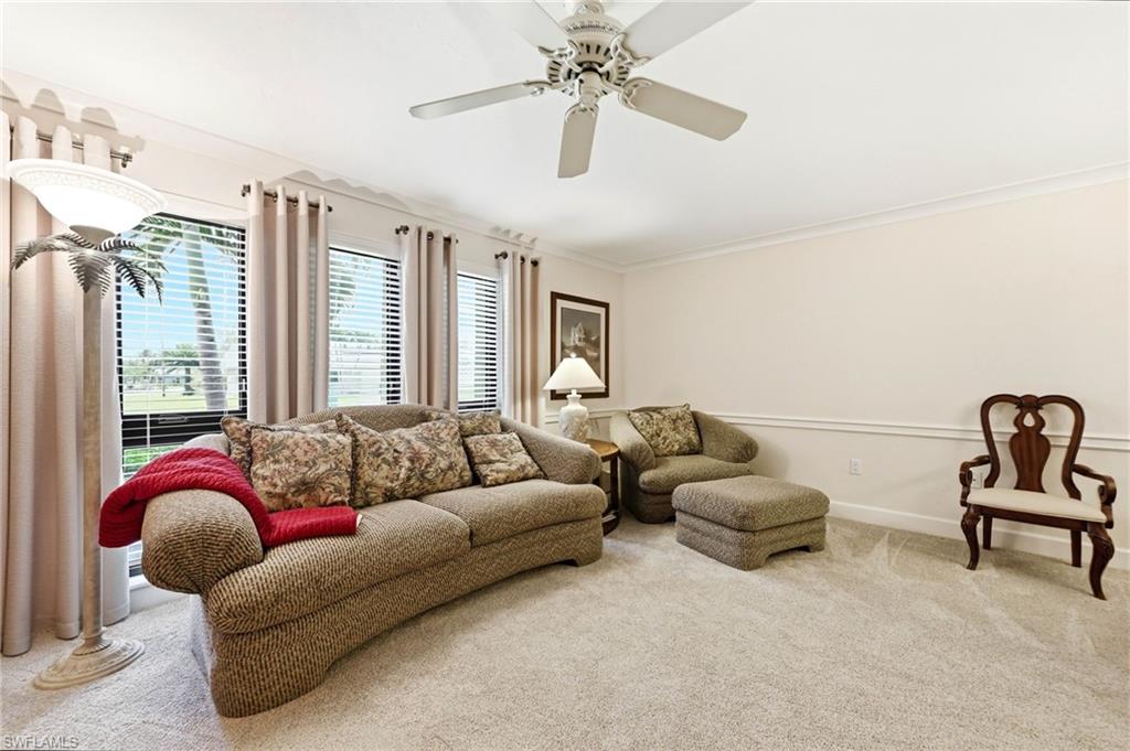 5201 31st Place Southwest Naples, FL 34116 - Photo 6 of 24 a living room with furniture