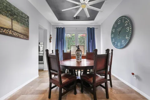 a kitchen with stainless steel appliances granite countertop a refrigerator sink and cabinets