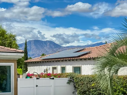 a view of a yard with a house