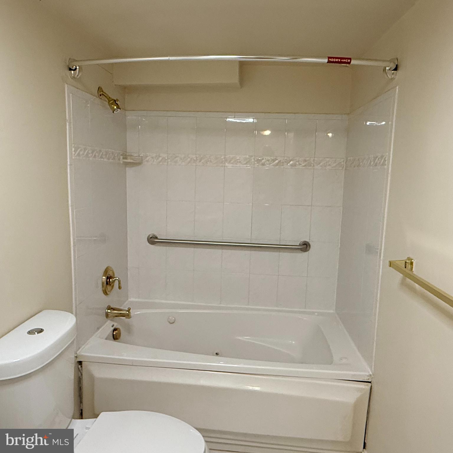 33 Randolph Place Northwest, Unit B Washington, DC 20001 - Photo 13 of 23 a bathroom with a shower and a toilet