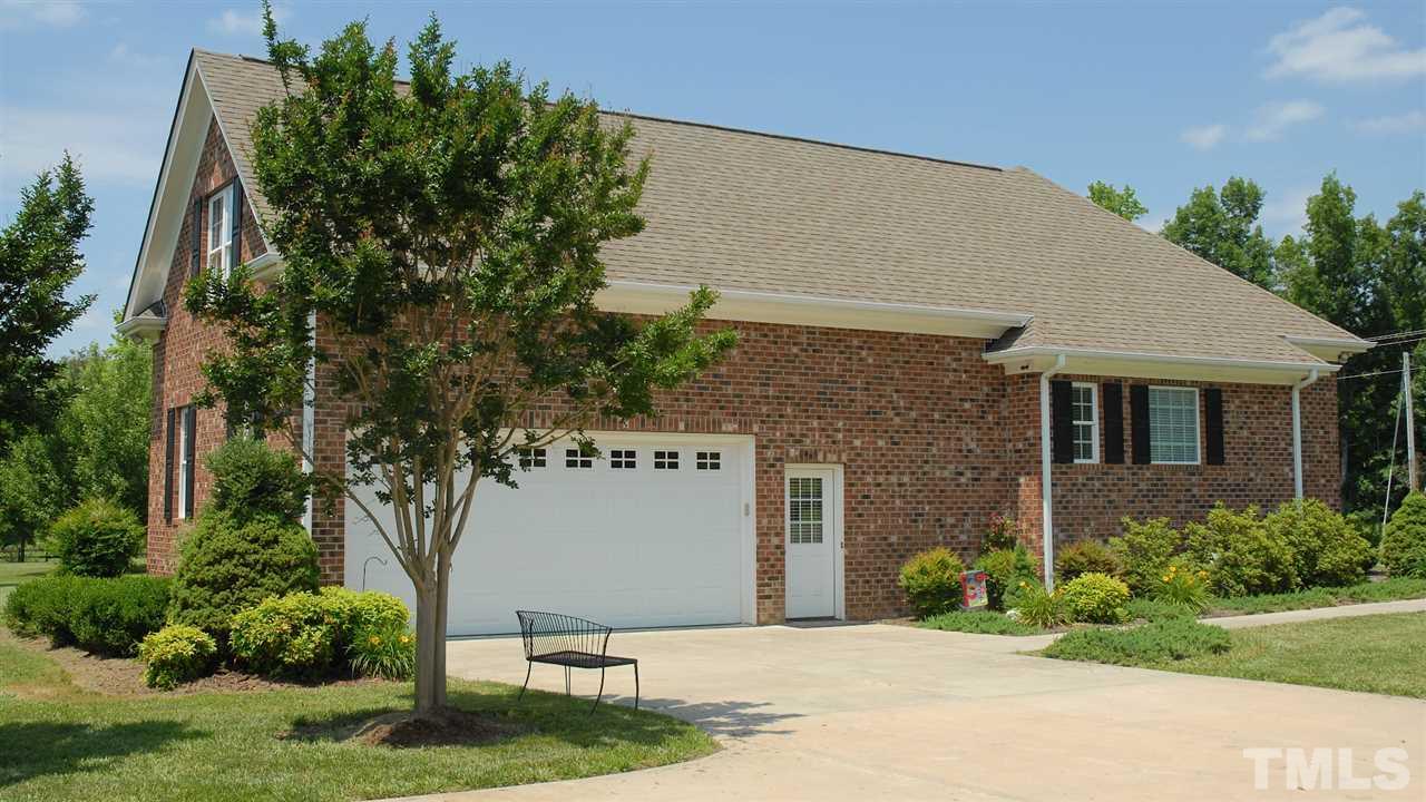 5390 Helena Moriah Road Rougemont, NC 27572 - Photo 4 of 25 Side view with two car garage.