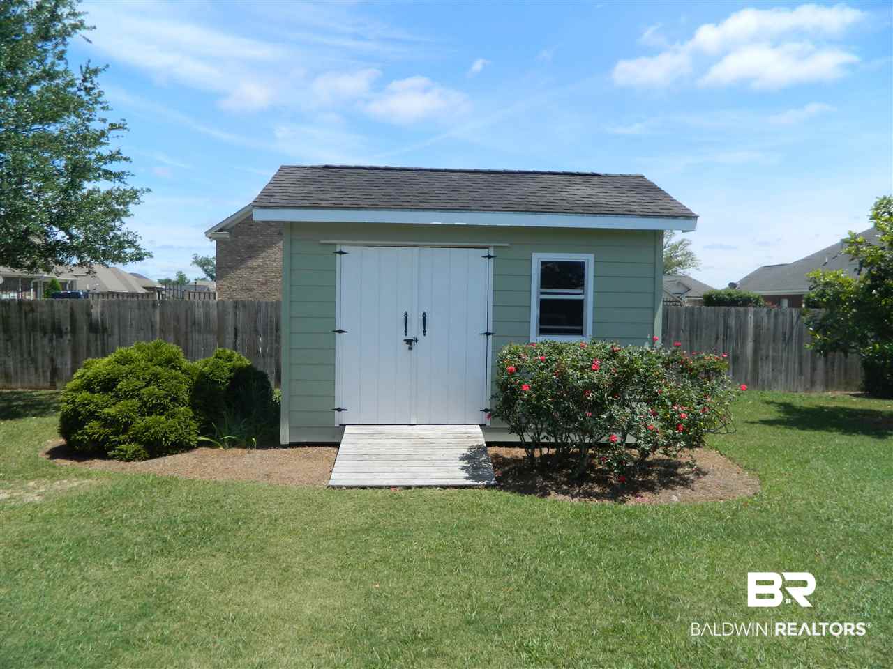 3990 Symphony Way West Semmes, AL 36575 - Photo 33 of 45 Ramp to the storage building with a window.