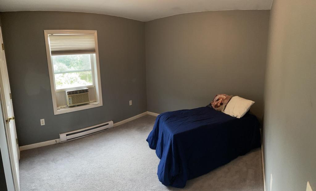 422 Stable Road Indiana, PA 15701 - Photo 17 of 32 a bed sitting in a bedroom next to a window