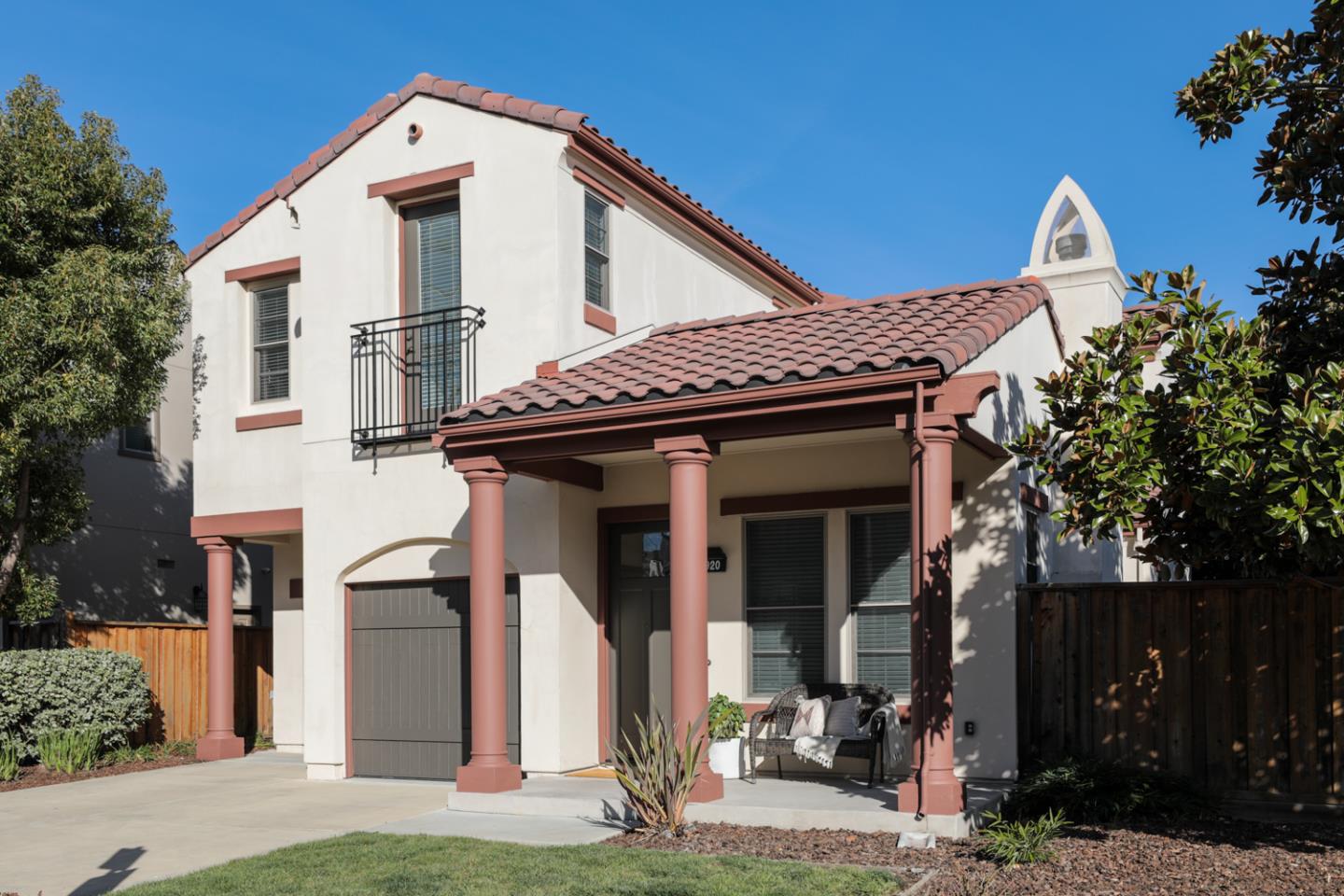 920 Rincon Street Mountain View, CA 94040 - Photo 2 of 45 a view of a house with brick walls and a tree